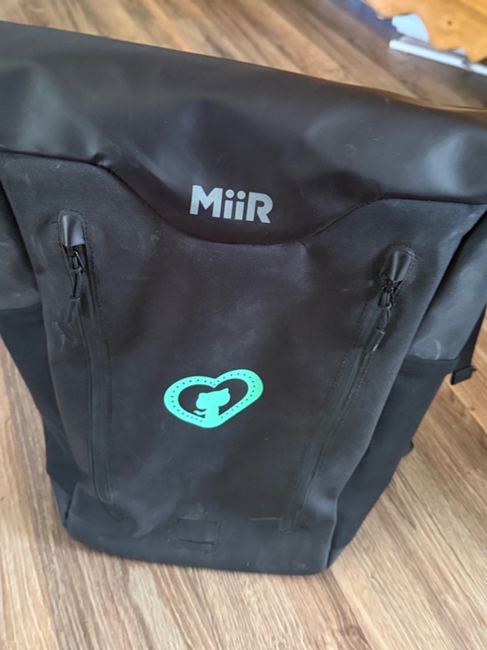 MiiR Black Roll-Top Backpack with Teal Heart Accent, recycled fabric